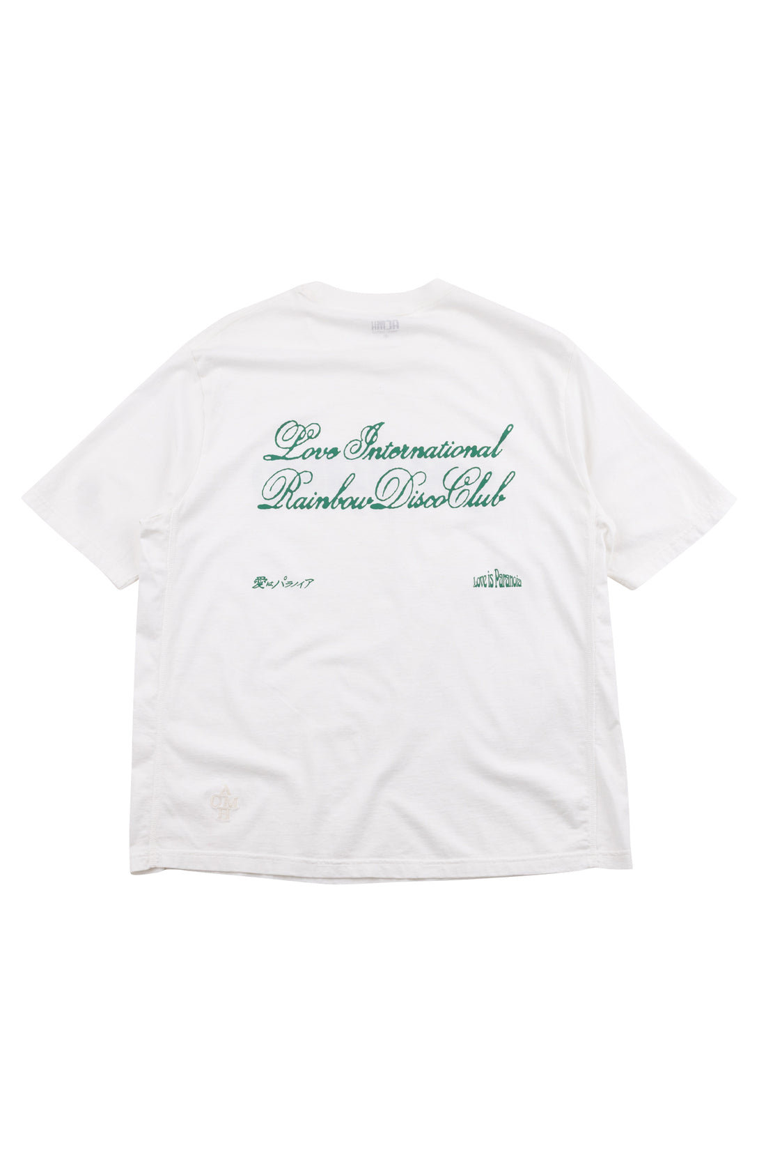 White t-shirt with green text on a white background
