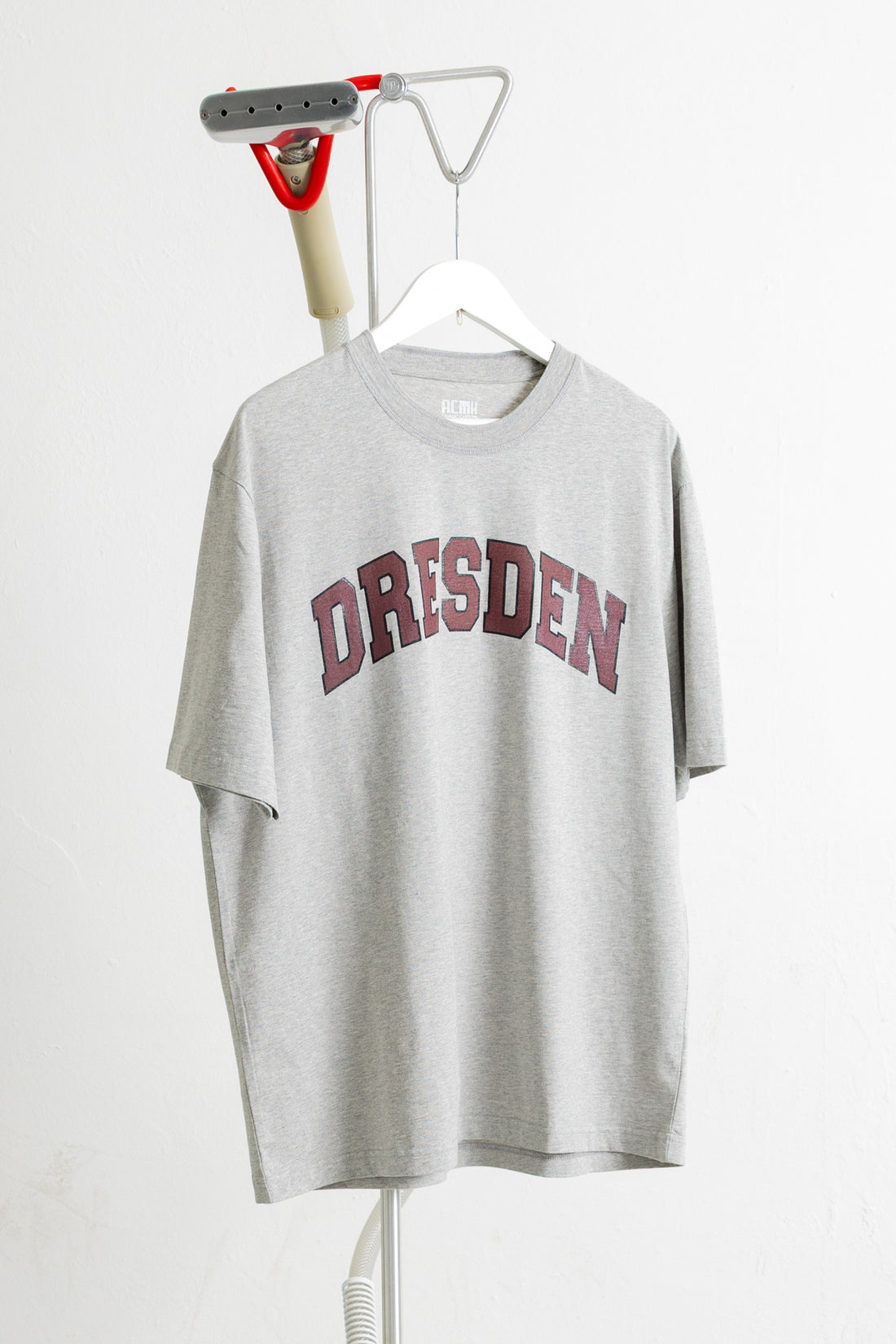 A light gray heather crewneck t-shirt with &